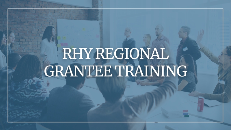Background image people gathered in a meeting room in front of a white board smiling with a grey overlay and text that reads: RHY Regional Grantee Training